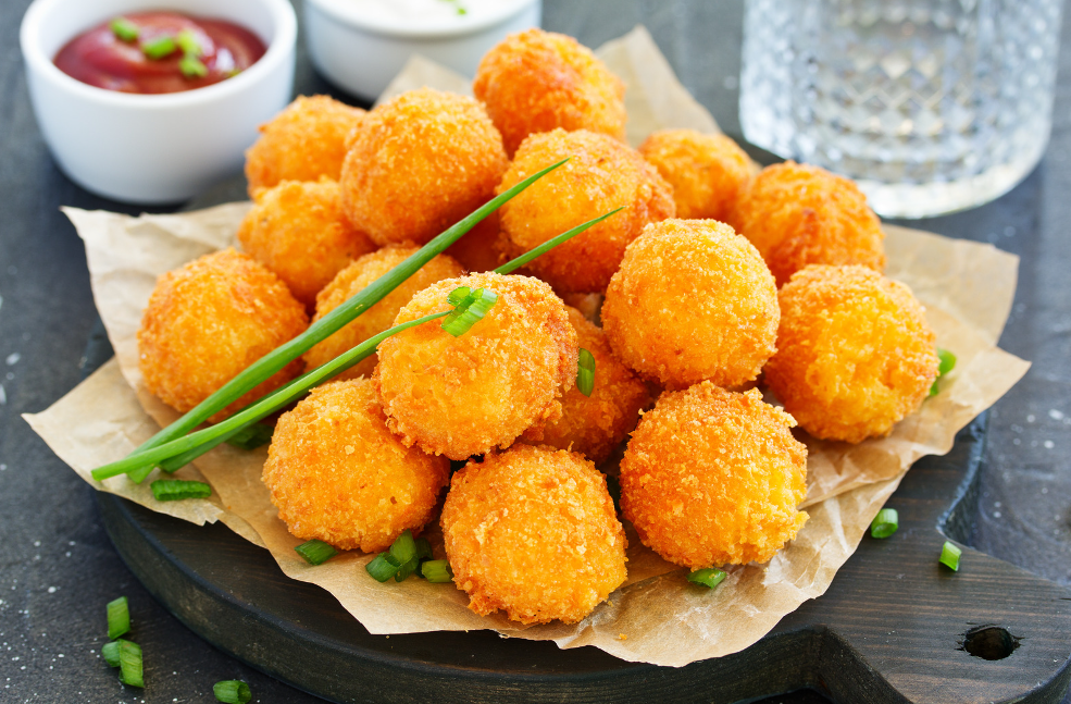 Step-by-step guide on how cheeseballs are made with ingredients and finished product.