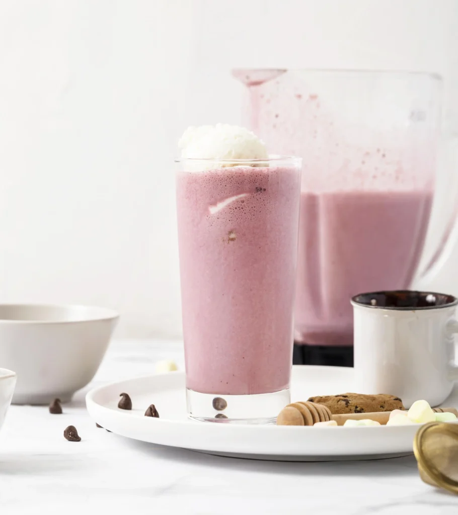 Ingredients in Starbucks Pink Drink including strawberry açaí base, coconut milk, and freeze-dried strawberries.