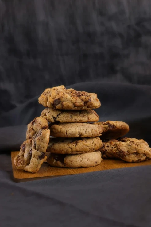 A comparison of chocolate chip cookies baked at 350°F and 375°F, highlighting texture and appearance differences.