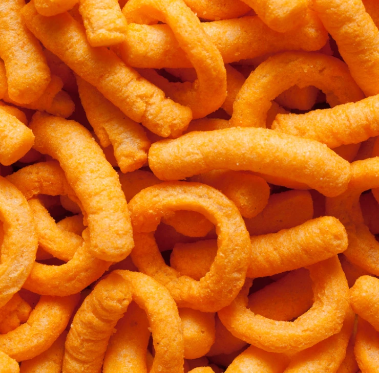 A tray of cheese puffs, highlighting their baked or fried texture.